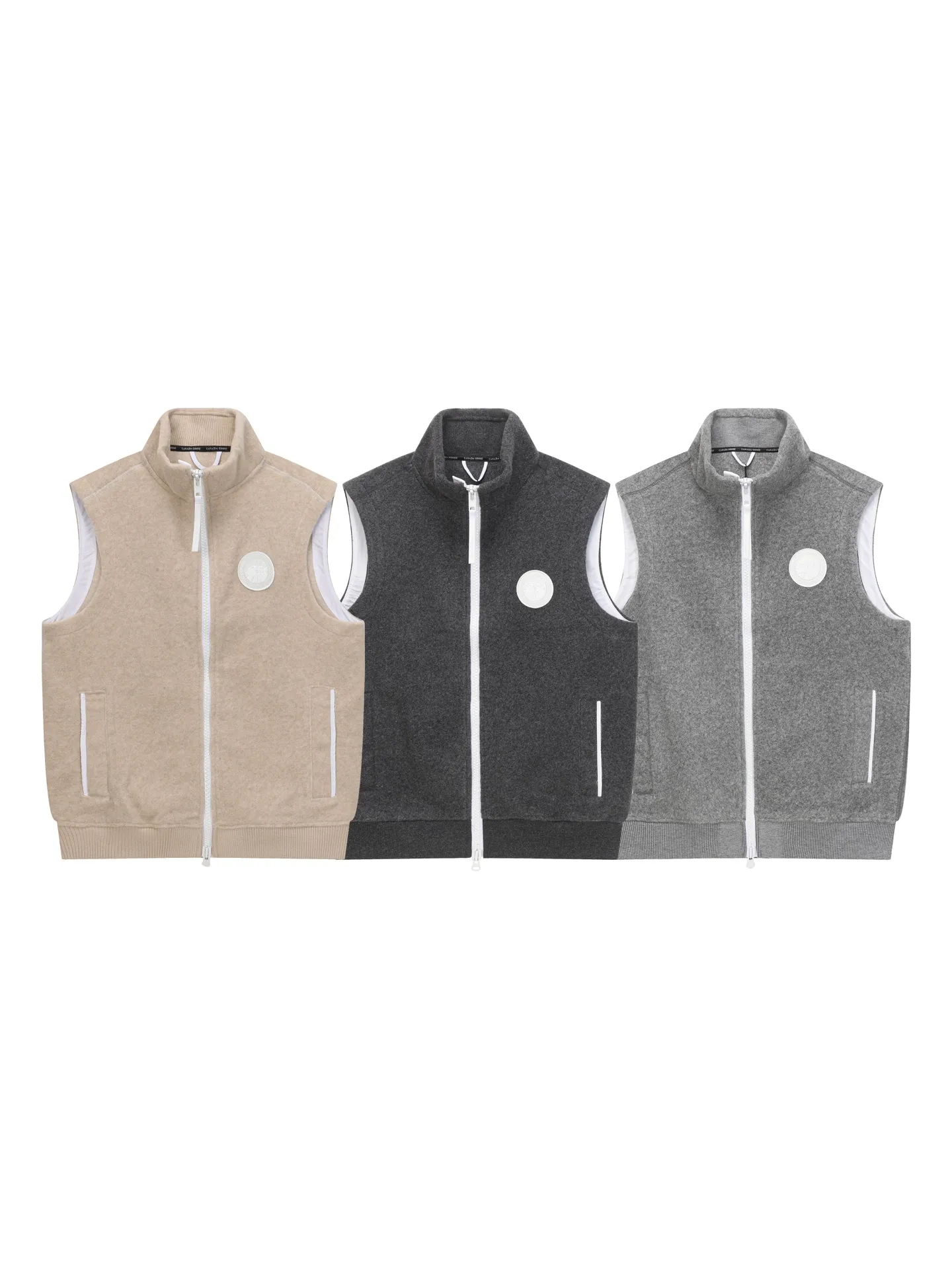 P600 Canada Giose/Canada Goose Mersey fleece vest 7052MB CANADA GOOSE Canada Goose Mersey men's wool fleece vest 7052MB ·Made of Kind Fleece wool fleece fabric, which can provide excellent comfort and diverse functionality ·A weatherproof placket is designed under the front zipper to prevent wind and keep warm ·Ribbed knit hem and articulated sleeves improve comfort and fit ·2 exterior pockets: both hand pockets with concealed buckles ·White Canada Goose disc logo embroidered on left chest.   A0 Size:S-XXL